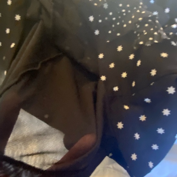 A strapless top with little tiny stars all over it. Ruffled front. - Picture 6 of 7